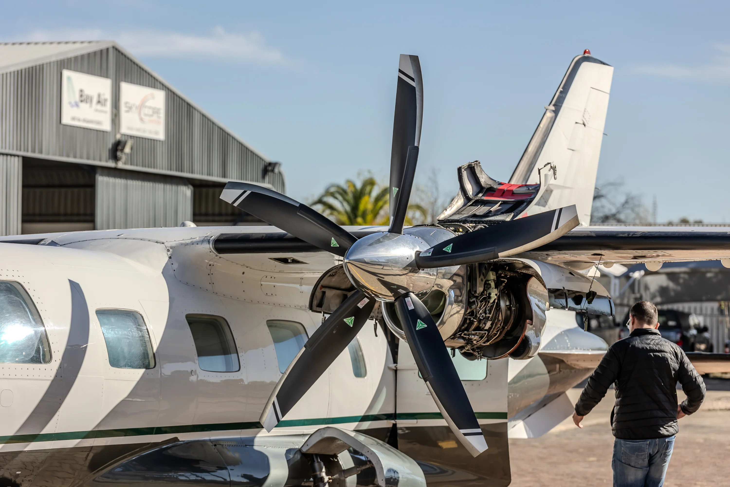 Twin-engine aircraft receiving propeller attention